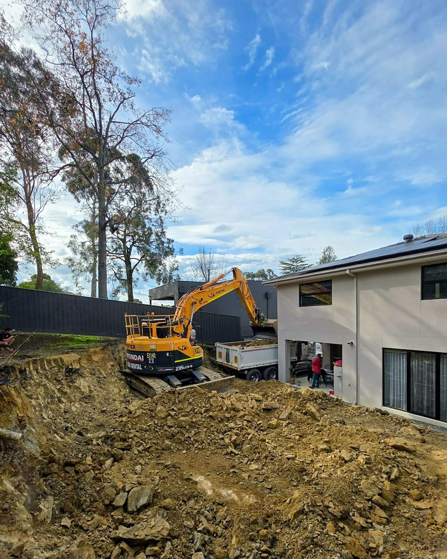 Major site cut alongside an occupied dwelling
