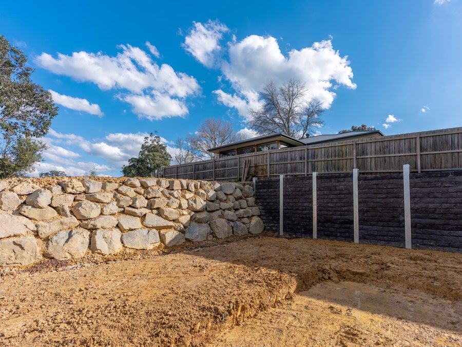 Yarra Junction, the finished engineered wall along the boundary