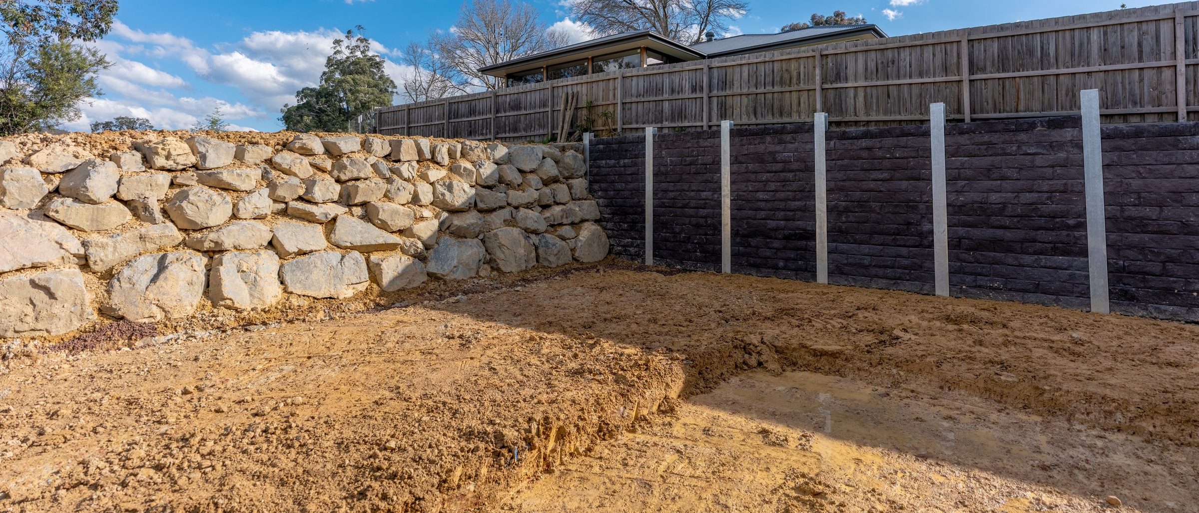 Yarra Junction, the finished engineered wall along the boundary