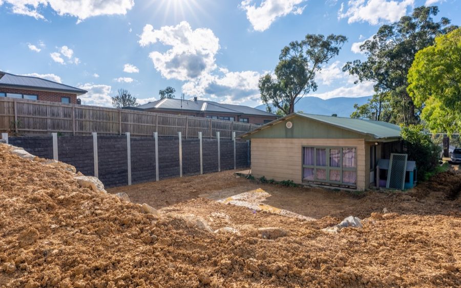 The completed engineered wall along the boundary, seen from the finished level